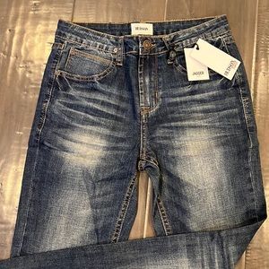 Hudson “Jagger” distressed slim jeans
